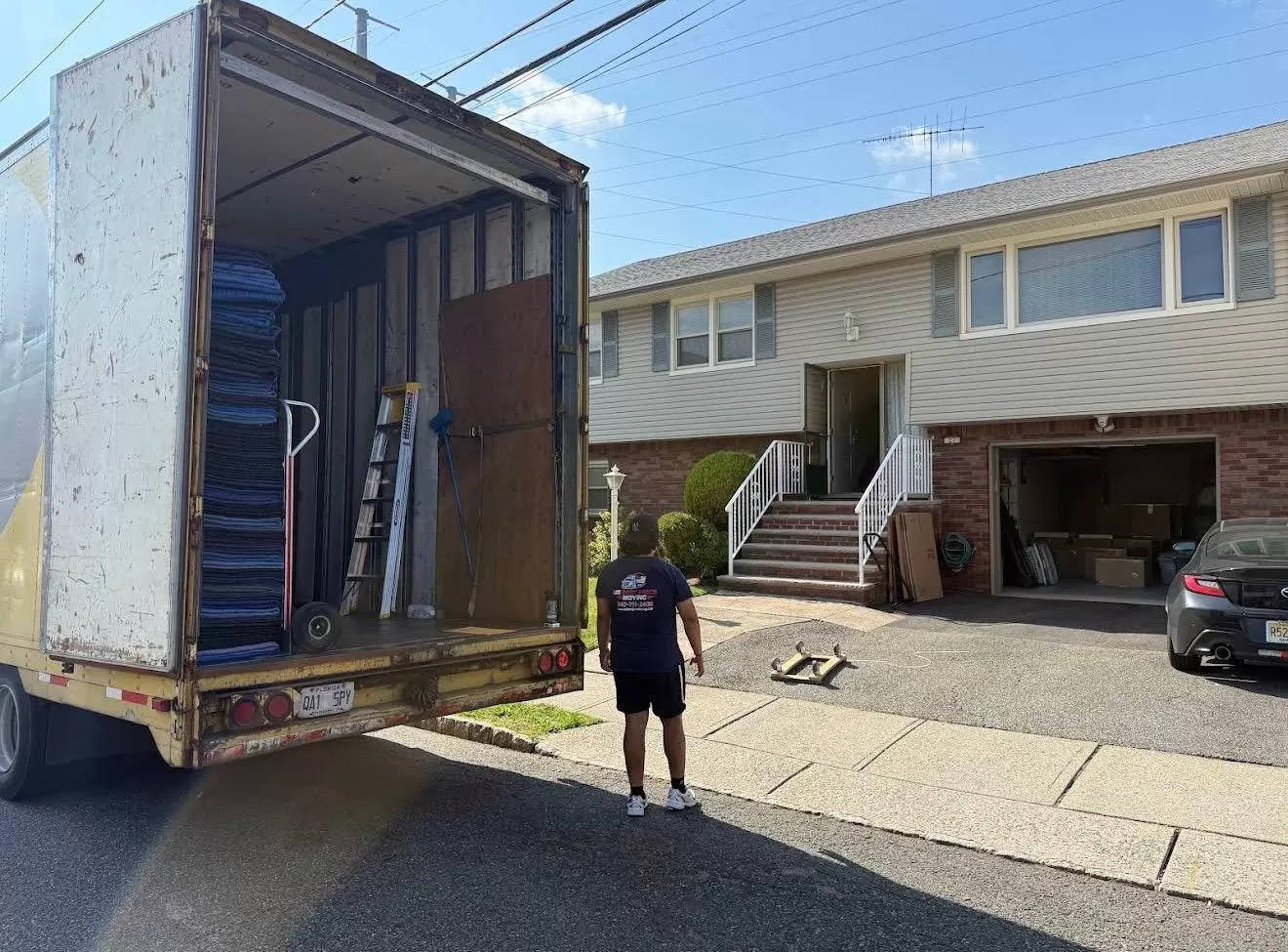 Professional movers packing a home